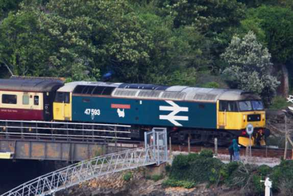05 August 2023 - 16:38:10
Diesel loco Galloway Princess 47593 assessed the Sir Nigel Gresley with some oomph from the rear.
------------------------
Loco 60007 Sir Nigel Gresley in Kingswear